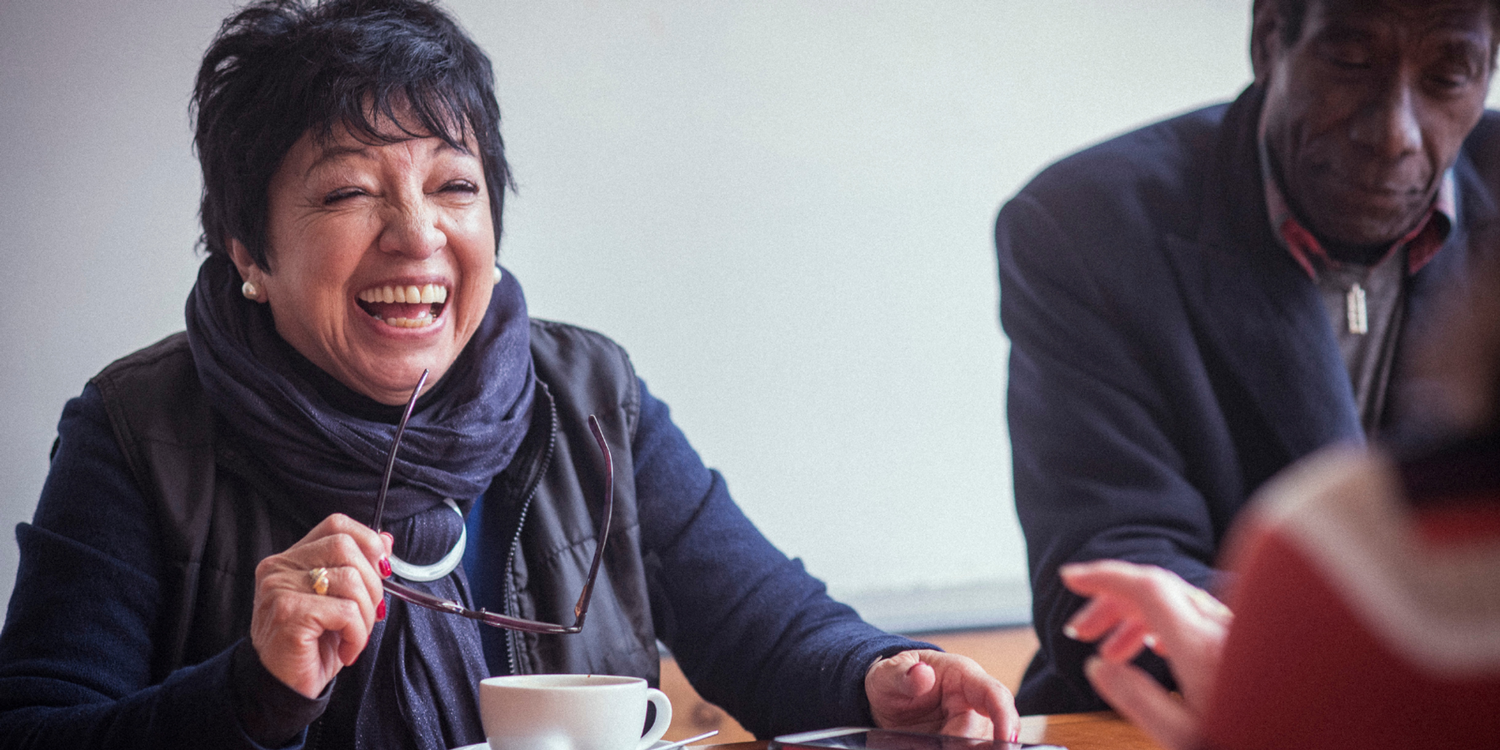 Woman Laughing with Glasses